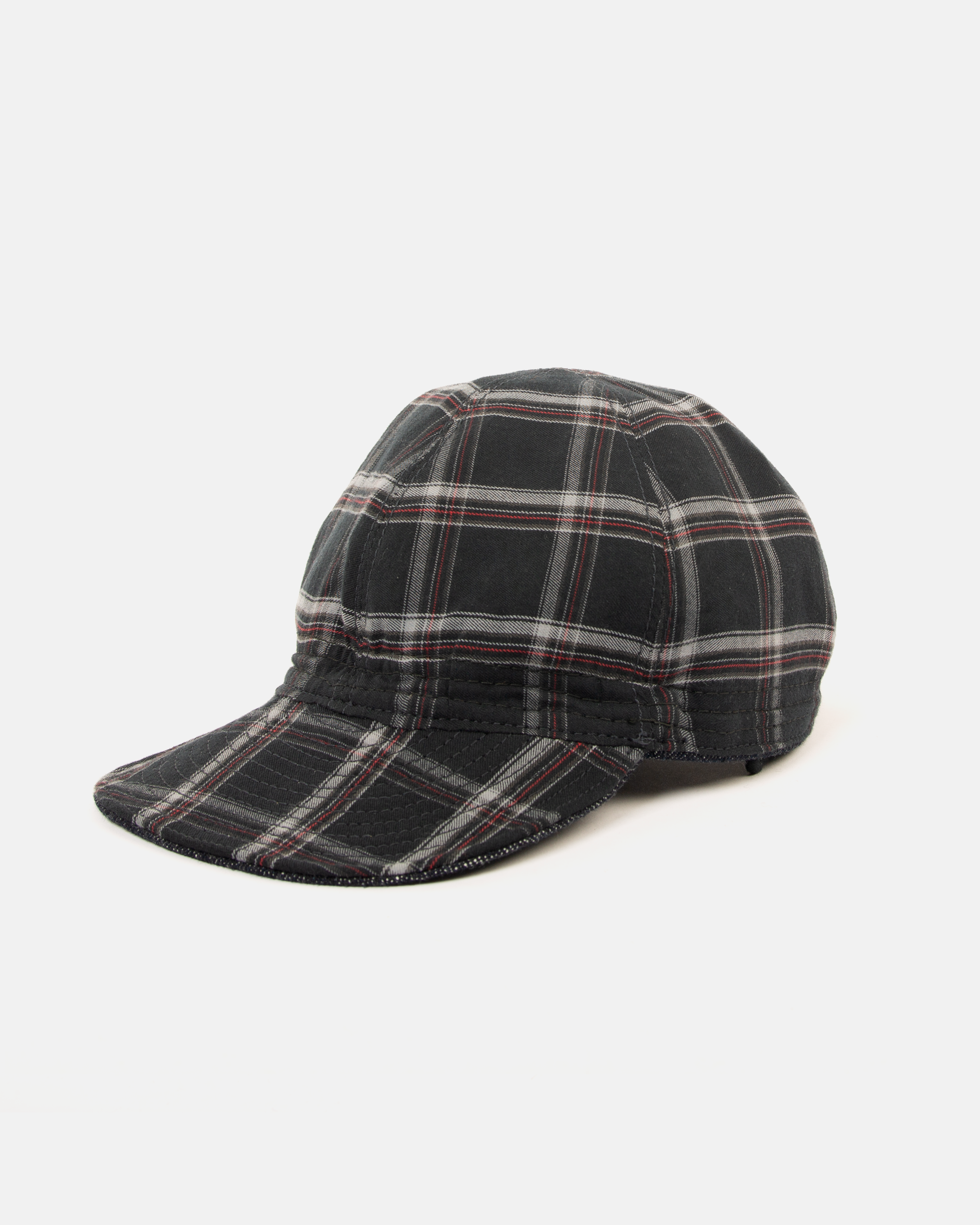 Reversible cap in reclaimed shirt